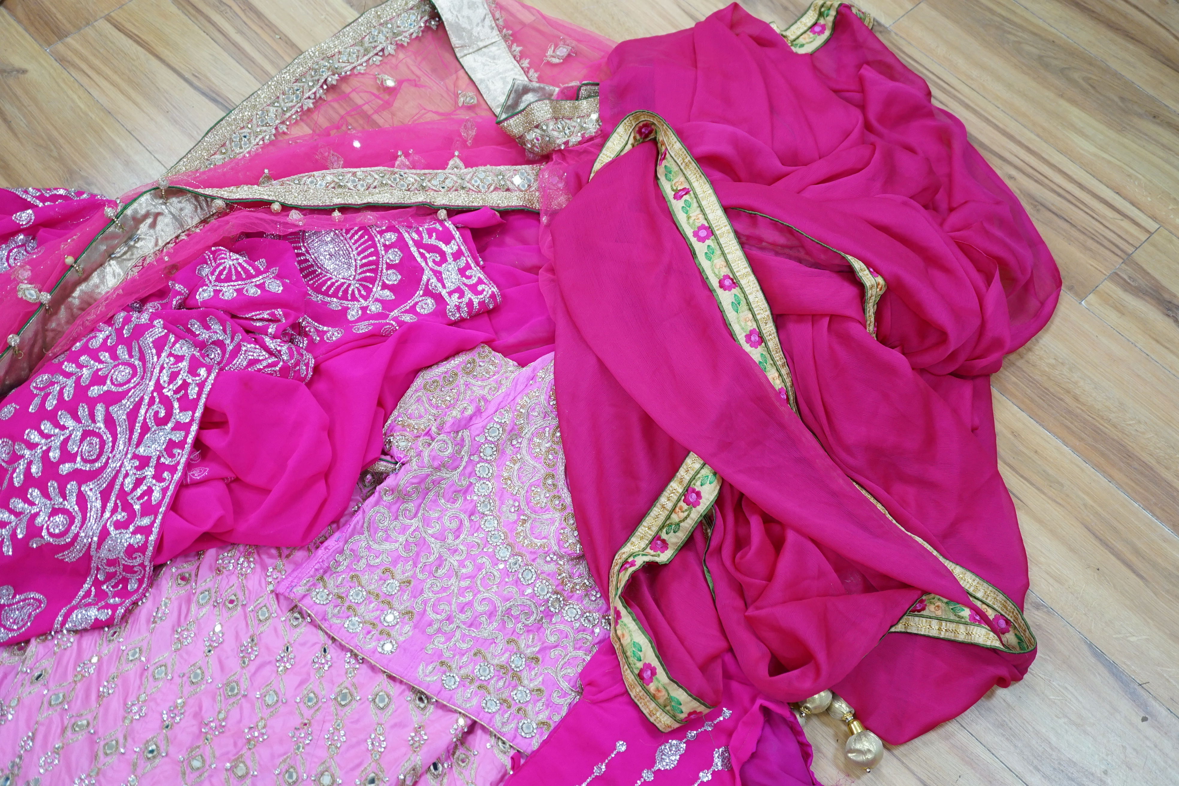 A collection of Indian silk saris and costume possibly bridal